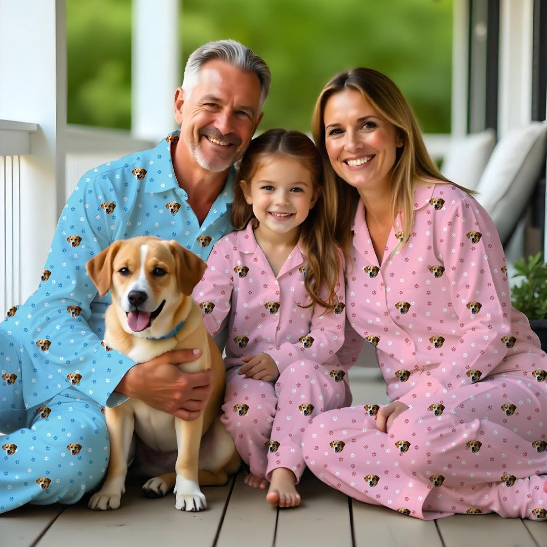 Family wearing matching Custom pet face pajama sets, blue and pink designs with dog print